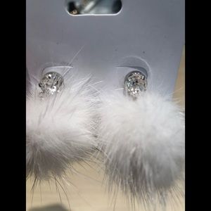 Fluffy white ear bobs